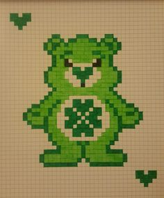 a green teddy bear made out of legos on a white wall with butterflies around it