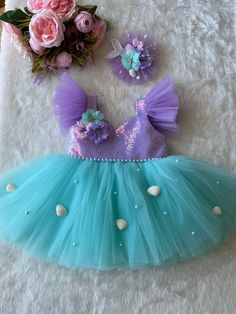 The mermaid themed hair accessory is sent as a gift along with the dress.💝  These are handmade dresses specially prepared for your baby. They are made with soft cotton lining. It has a zipper on the back and is easy and convenient to use.  👉🏻You can leave a message for more questions  👉🏻Dress: Pearl and original seashell are used in the skirt part, it is a handmade dress that you can prepare individually. Very dense tulle layers are used, very fluffy, personalized color options are available, you can customize it🌸  ✈️ Express delivery in 1-5 days Mermaid Birthday Dress, 1st Birthday Mermaid, Mermaid Tutu Dress, Mermaid Party Dress, 1st Birthday Dress, Mermaid Tutu, Birthday Mermaid, Ariel Dress, Girl 1st Birthday