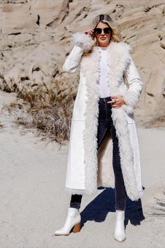 Winter White Long Outerwear, Winter White Long Outerwear For Winter, Long Winter White Outerwear, Chic Winter Fur Coat With Faux Fur Lining, White Sheepskin Outerwear For Winter, White Sheepskin Winter Outerwear, Fitted Sheepskin Outerwear For Winter, Cream Sheepskin Outerwear For Fall, Elegant Faux Fur Winter Outerwear