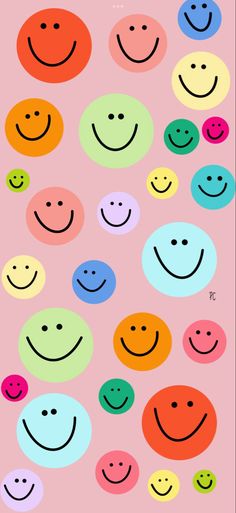 an image of colorful smiley faces on a pink background