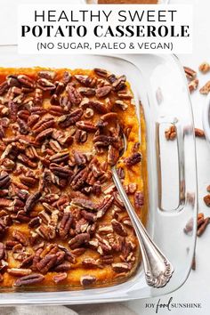 healthy sweet potato casserole topped with pecans