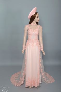 Custom made blush pink bridal Ao Dai Neckline: traditional collar Illusion front and back Long sleeves Zipper closure Chapel train (20''/50cm) Chiffon pants Made to your own measurements Pink Floor-length Wedding Dress With Sweep Train, Pink Evening Dress With Sheer Bodice For Debutante Ball, Pink Floor-length Ball Gown For Wedding, Pink Gown With Fitted Bodice For Wedding, Pink Wedding Gown With Fitted Bodice, Pink Lace Bodice Evening Dress For Wedding, Pink Floor-length Gown With Detachable Train, Pink Wedding Gown With Sweep Train, Pink Tulle Dress For Ceremony