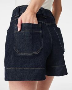 Crafted from our premium stretch denim, this trouser short is a more tailored take on the classic jean short. Our pull-on style features hidden core shaping technology, functional pockets and a flattering A-line silhouette. Hits at natural waist for great coverage Fitted through the waist with a break for an A-line silhouette 13.62" approximate leg opening Inseam: 4" Premium stretch denim Hidden core shaping technology Pull-on design Wide waistband with functional belt loops Functional front and Denim Shorts Outfit, Denim Ideas, Jean Short, Classic Jeans, Shorts Jeans, Shoes With Jeans, Denim Trousers, Swimwear Tops, Long Tops