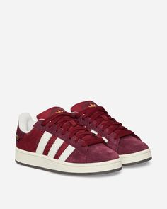 adidas Campus 00s Sneakers Collegiate Burgundy / Off White / Maroon.After debuting on parquet, the adidas Campus quickly expanded its horizons. With this version, the iconic silhouette moves in a new direction using contemporary materials, colours and proportions..Mesh Upper.Suede Overlays.Textile Lining.Rubber Outsole.Style Code: ID2076 Maroon Sneakers, Red Campus 00s, Burgundy Adidas, Adidas Campus Red And Pink, Sporty Burgundy Sneakers, University Red Adidas Lace-up Sneakers, Dolce Vita Sneakers, Campus Addis’s, Cute Adidas Shoes