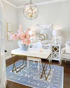 the instagram page shows an image of a dining room with white furniture and pink flowers