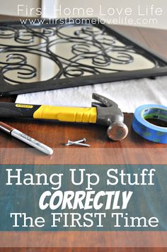 some tools are sitting on top of a table with the words hang up stuff correctly