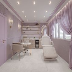 the room is decorated in lavender tones and has two chairs, a desk, and a couch