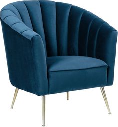 a blue velvet chair with gold legs