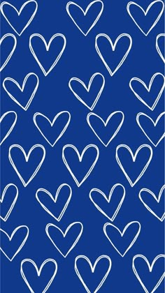 a blue background with white hearts in the shape of heart's on top and bottom