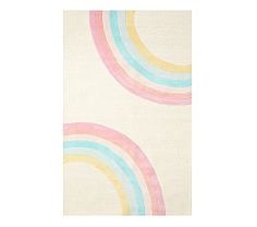 a white rug with rainbows on it