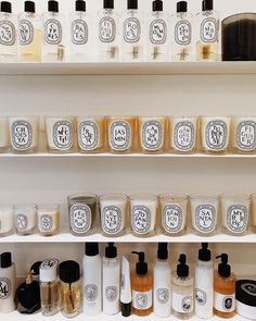 many different types of soaps and lotions are on the shelves next to each other