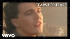 a young man with his mouth open and stars in the sky behind him that says tears for fears