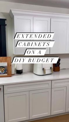 a kitchen with white cabinets and black lettering over the top that says extended cabinets on a diy budget