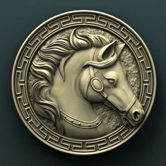 a metal medallion with a horse's head on it