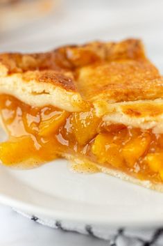 a piece of pie sitting on top of a white plate