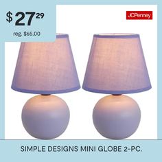 two white lamps sitting next to each other on a blue background with the price $ 27 99