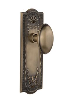 an antique door handle with glass knob