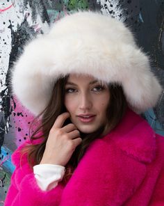 Indulge in luxurious warmth this season with our Faux Fox Fur Bucket Hat. A timeless and glamorous addition to your winter wardrobe, it pairs perfectly with both casual and formal looks. Chic Beanie Hat For Winter, Chic Beanie For Winter, White Fur Felt Hat For Winter, Winter Fur Felt Hats For Cold Weather, White Fur Felt Winter Hat, Brimmed Fur Felt Cloche Hat For Winter, Winter Fur Felt Brimmed Cloche Hat, Winter Brimmed Fur Felt Cloche Hat, Winter Brimmed Cloche Hat In Fur Felt