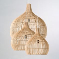 two hanging lights made out of bamboo sticks