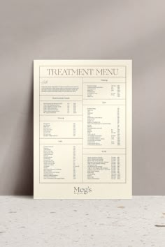 a white menu sitting on top of a table