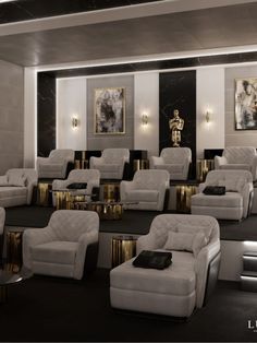 a room filled with lots of white chairs and gold tables next to each other on top of black carpeted flooring