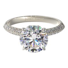 a diamond engagement ring on a white background