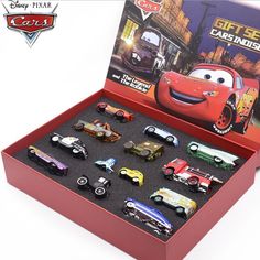 the cars in the box are all different colors and sizes, but one is red