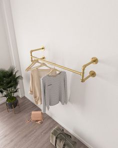 Gold Retro Clothing Rack | Easy Assembly & Customization Iron Clothes Rack, Practical Clothes, Wall Mounted Clothing Rack, Clothing Display, Open Wardrobe, Golden Wall, Clothes Hanging, Clothing Displays, Wardrobe Solutions