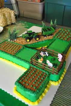 a cake made to look like a farm scene