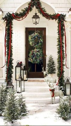 a christmas porch decorated for the holiday season