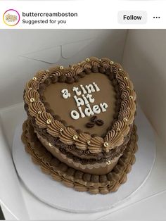 a heart shaped chocolate cake with the words 8 th birthday written on it