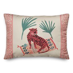 a pillow with a tiger on it and palm trees in the backgroung