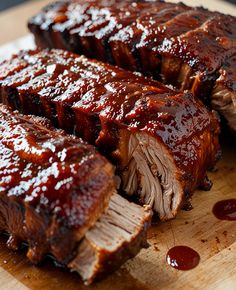 sliced meat on a cutting board with ketchup