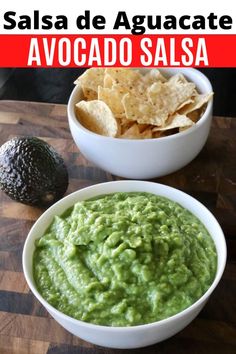 two bowls filled with guacamole and tortilla chips