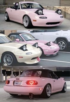 two pink cars parked next to each other