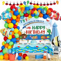 a birthday party with balloons and decorations