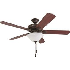 a ceiling fan that is hanging from the ceiling