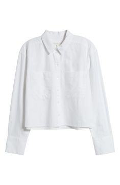 The classic Oxford button-up gets a comfortable refresh with a boxy, slightly oversized silhouette cut from cool, breathable cotton. 21 1/2" length (size Medium) Front button closure Spread collar Long sleeves with button cuffs Chest patch pockets 100% cotton Machine wash, tumble dry Imported Classic Cropped Button-up Shirt With Button Cuffs, Relaxed Fit Cotton Cropped Button-up Shirt, Oversized Cotton Shirt In Effortless Style, Cotton Cropped Shirt With Button Cuffs For Spring, White Long Sleeve Cropped Shirt With Button Closure, Classic Collared Cropped Shirt With Pockets, Button-up Cotton Tops For Daywear, Unstructured Collared Tops For Spring, Casual Cotton Blouse With Button Cuffs