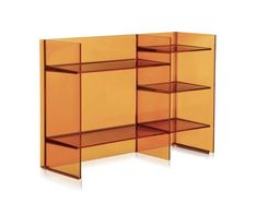 an orange glass cabinet with shelves on each side