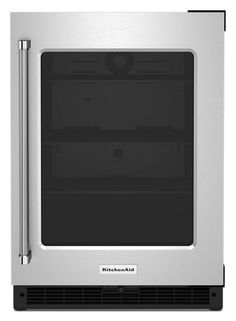 a stainless steel oven with the door open