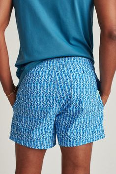 Riviera Recycled Swim Trunks | Bonobos Functional Relaxed Fit Swim Trunks With Pockets, Sporty Blue Bottoms For Travel, Blue Travel Bottoms With Pockets, Blue Bottoms With Pockets For Travel, Relaxed Fit Travel Shorts With Pockets, Travel Shorts With Elastic Waistband, Blue Travel Shorts, Short Travel Bottoms With Side Pockets, Navy Shorts