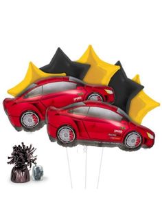 two red sports cars with black and yellow balloons