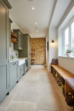 an empty kitchen with lots of counter space