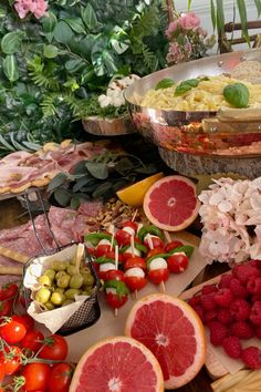 a table topped with lots of different types of food