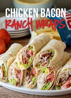 chicken bacon ranch wraps on a white plate with chips and tomatoes in the background text reads, chicken bacon ranch wraps