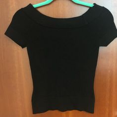 This Shirt Is Form Fitting And Lightweight Sweater Material. Looks Brand New. Black Stretch Knit Top With Short Sleeves, Black Fitted Knit Top With Short Sleeves, Black Fitted Knit Top Short Sleeve, Chic Black Short Sleeve Knit Top, Casual Fitted Black Knit Top, Black Fitted Casual Knit Top, Casual Black Fitted Knit Top, Casual Fitted Black Blouse, Black Short Sleeve Knit Top For Fall