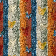 an orange and blue striped rug with butterflies on it