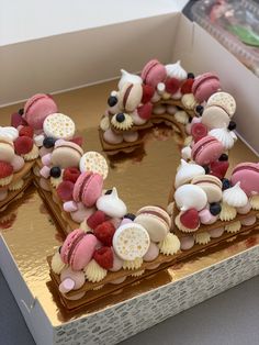 a heart shaped cake in a box on a table