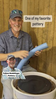 a man sitting in front of a large pot with a blue pipe sticking out of it