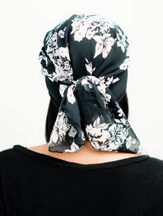 This pretied head scarf is from Linda Christen Designs Life Style Collection. This sheer black and white floral chiffon head scarf can be worn in many ways. Are you going for a trendy look? Protect your hair and preserve your hairstyle at the same time with this light weight head scarf. The scarf makes it easy to lay your hair down and protects your hair from the sun and the elements while you look fabulous doing so. Perfect for looking fashionable and trendy while running errands or meeting a f Black Bohemian Headwrap For The Beach, Black Bohemian Headscarf For Summer, Adjustable Black Headwrap For Beach, Adjustable Black Headwrap For The Beach, Chic Summer Headwrap, Black Bohemian Headwrap For Summer, Elegant Headscarf For Spring Beach Outings, Chic Summer Headscarf One Size, Floral Print Bandana For Summer